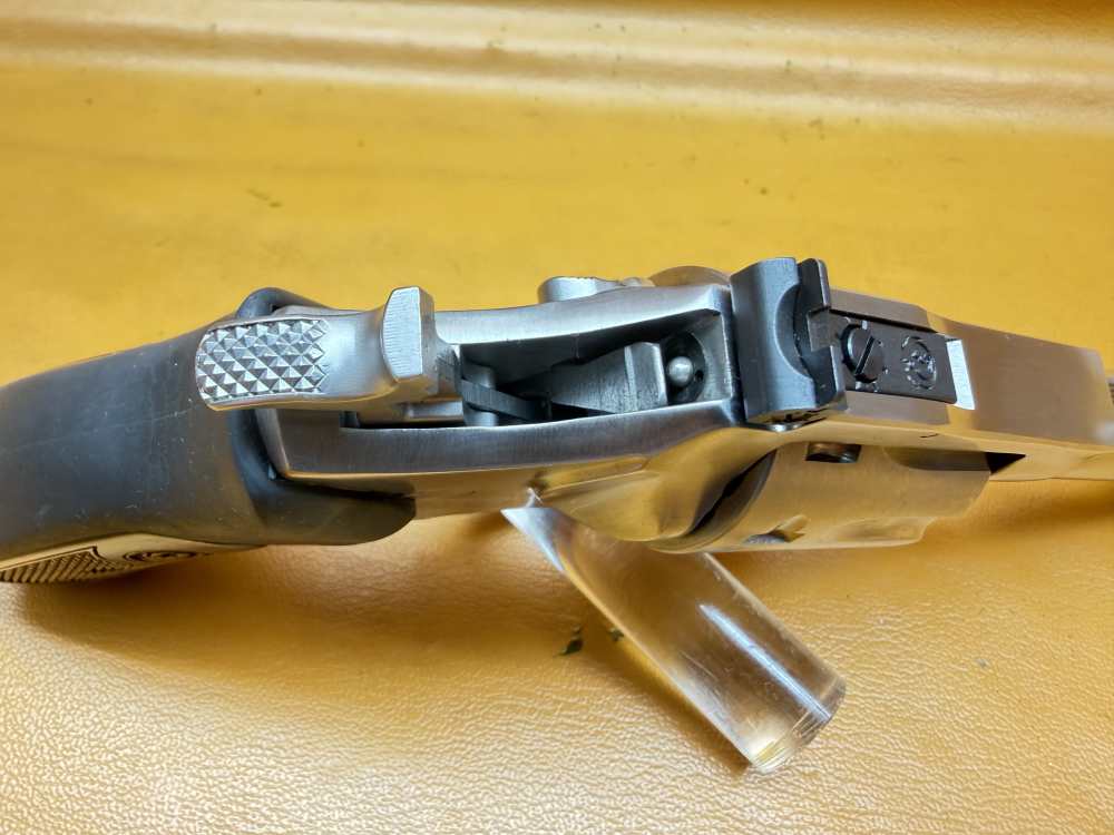 Ruger SP101 8-Shot .22 LR Revolver – 4.2" Stainless, Wood Insert Grips-img-15