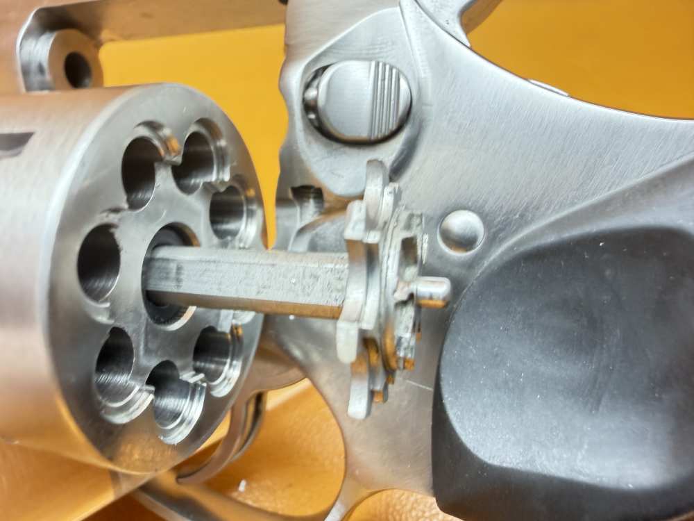 Ruger SP101 8-Shot .22 LR Revolver – 4.2" Stainless, Wood Insert Grips-img-9