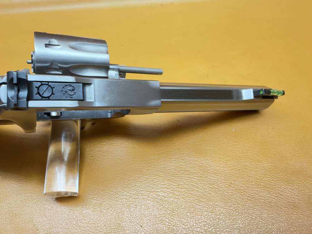 Ruger SP101 8-Shot .22 LR Revolver – 4.2" Stainless, Wood Insert Grips-img-14