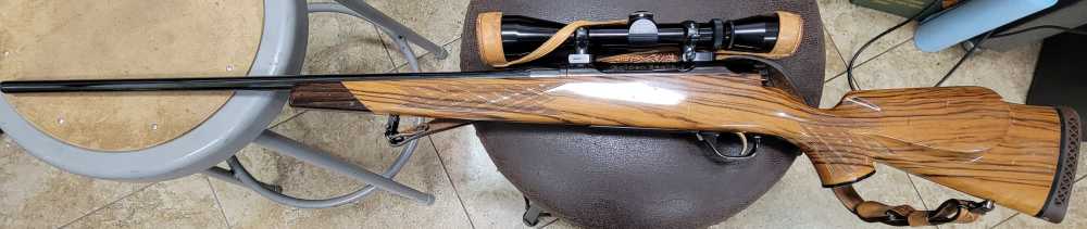 Golden Eagle Model 7000 7mm Mag Rifle W/Leupold 3x9 Vari X II-img-0