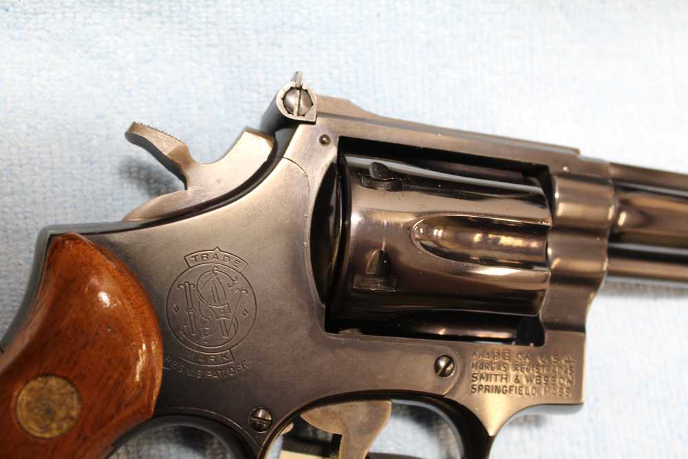 Smith & Wesson Model 17-4, .22 LR 8. 3/8 barrel, blued wood grips-img-12