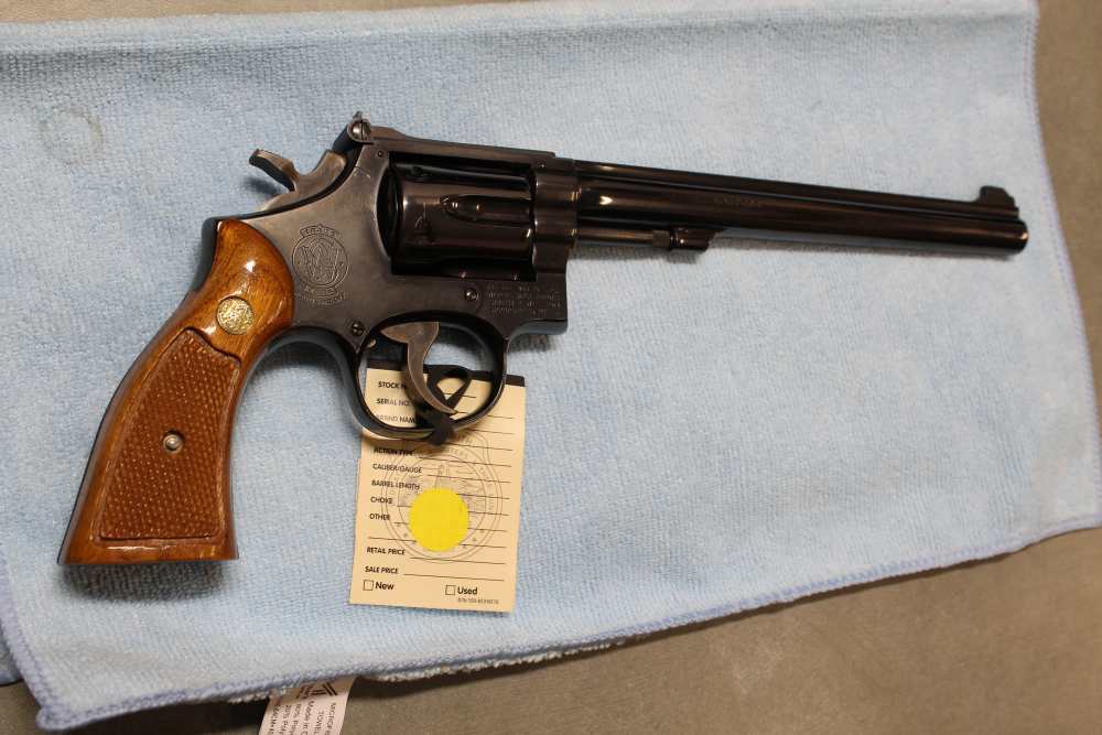 Smith & Wesson Model 17-4, .22 LR 8. 3/8 barrel, blued wood grips-img-9