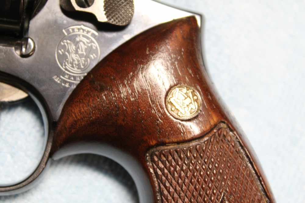 Smith & Weeson Model 19-5 revolver in .357 Magnum, blued with wood grips-img-24