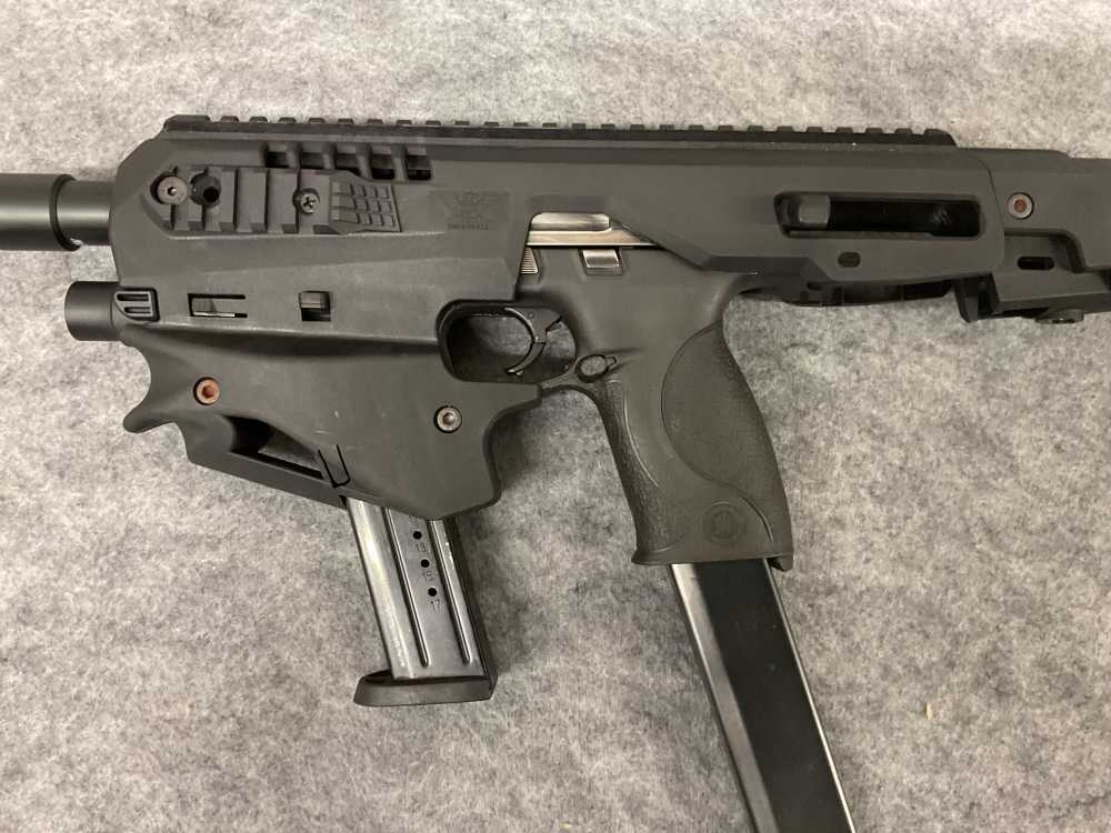 Smith and Wesson M&P 9 with CAA USA Micro Conversion Kit + extended mag-img-8