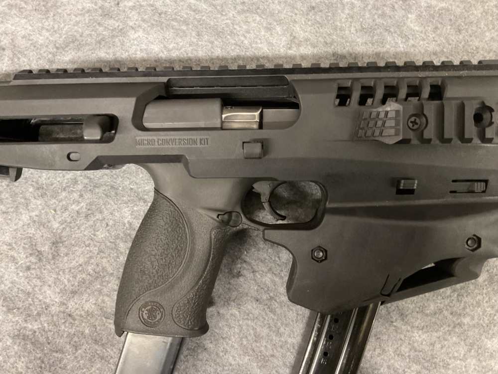 Smith and Wesson M&P 9 with CAA USA Micro Conversion Kit + extended mag-img-6