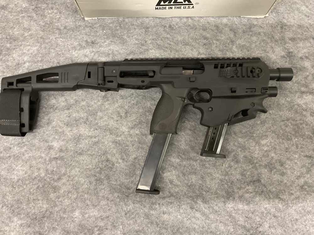 Smith and Wesson M&P 9 with CAA USA Micro Conversion Kit + extended mag-img-5