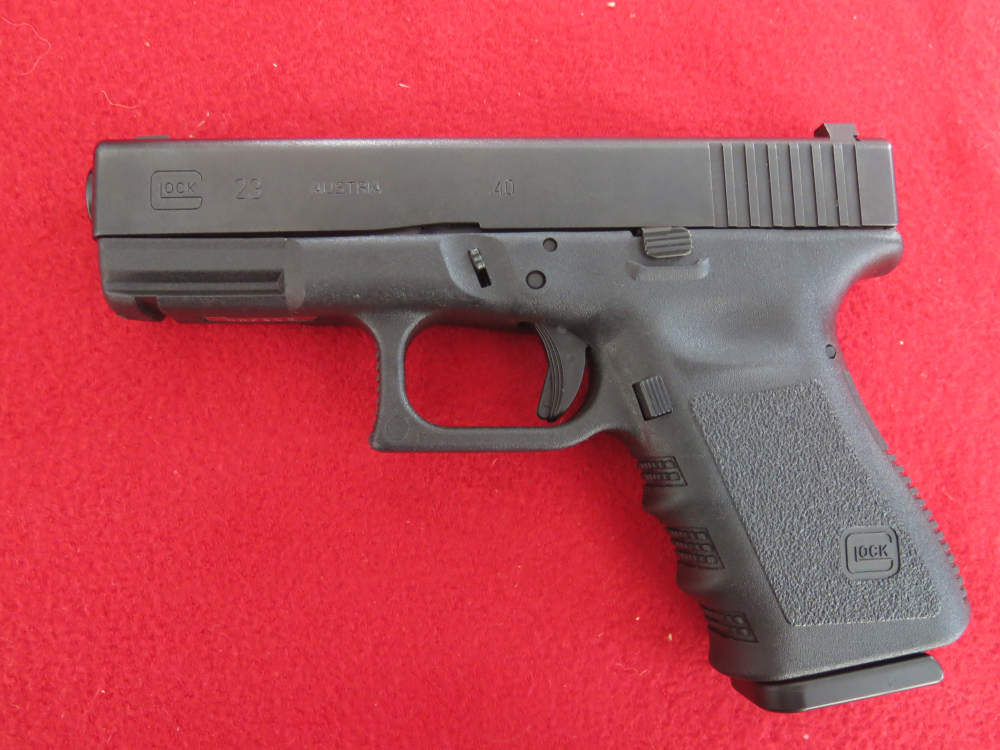 Glock Model 23 In 40 S&W  4” Barrel Factory Hard Case-Manual-Mag Loader-img-1