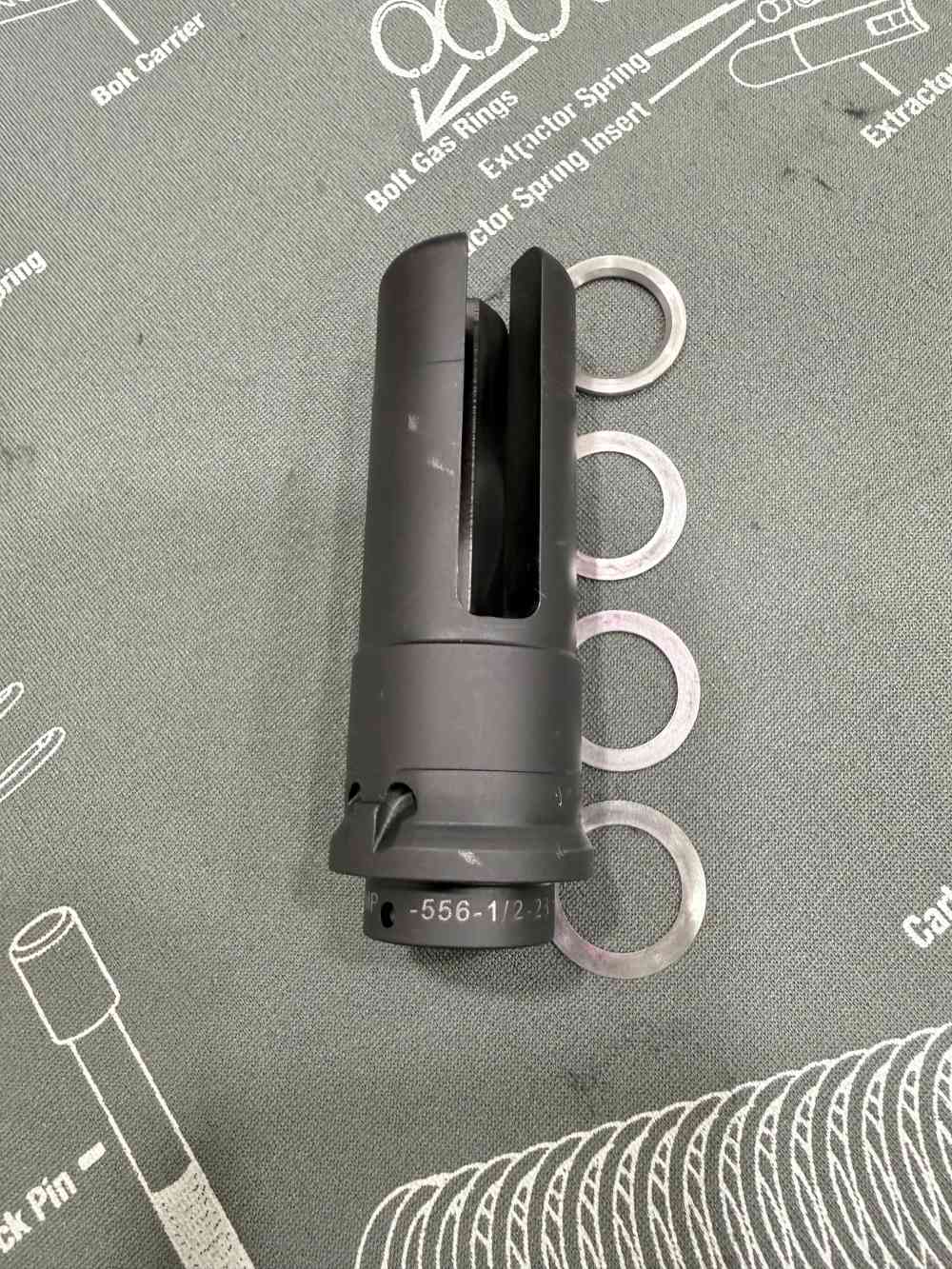 SureFire WARCOMP 556 3-Prong Flash Hider 1/2x28 – Lightly Used w/ Shims-img-1