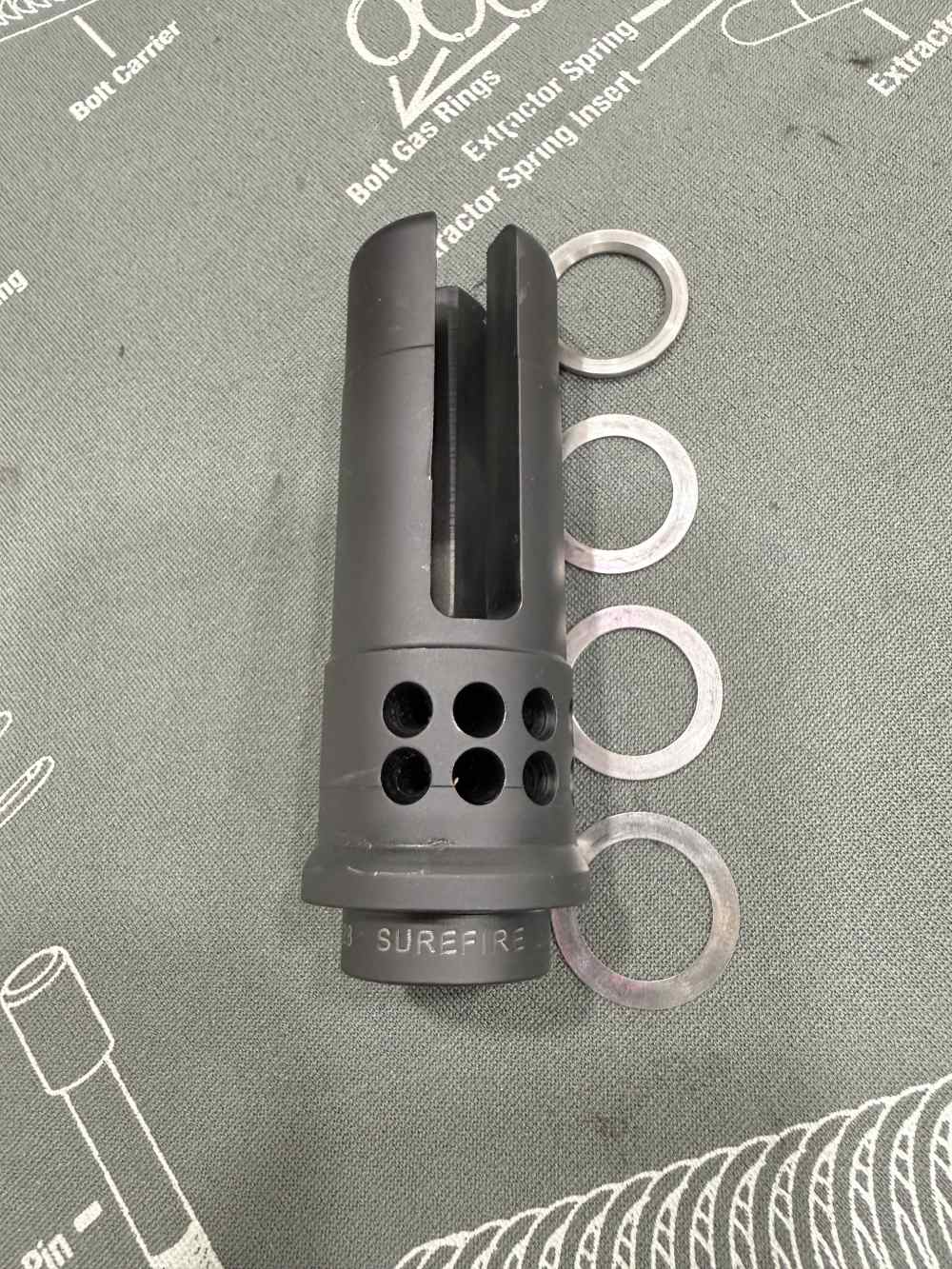 SureFire WARCOMP 556 3-Prong Flash Hider 1/2x28 – Lightly Used w/ Shims-img-2