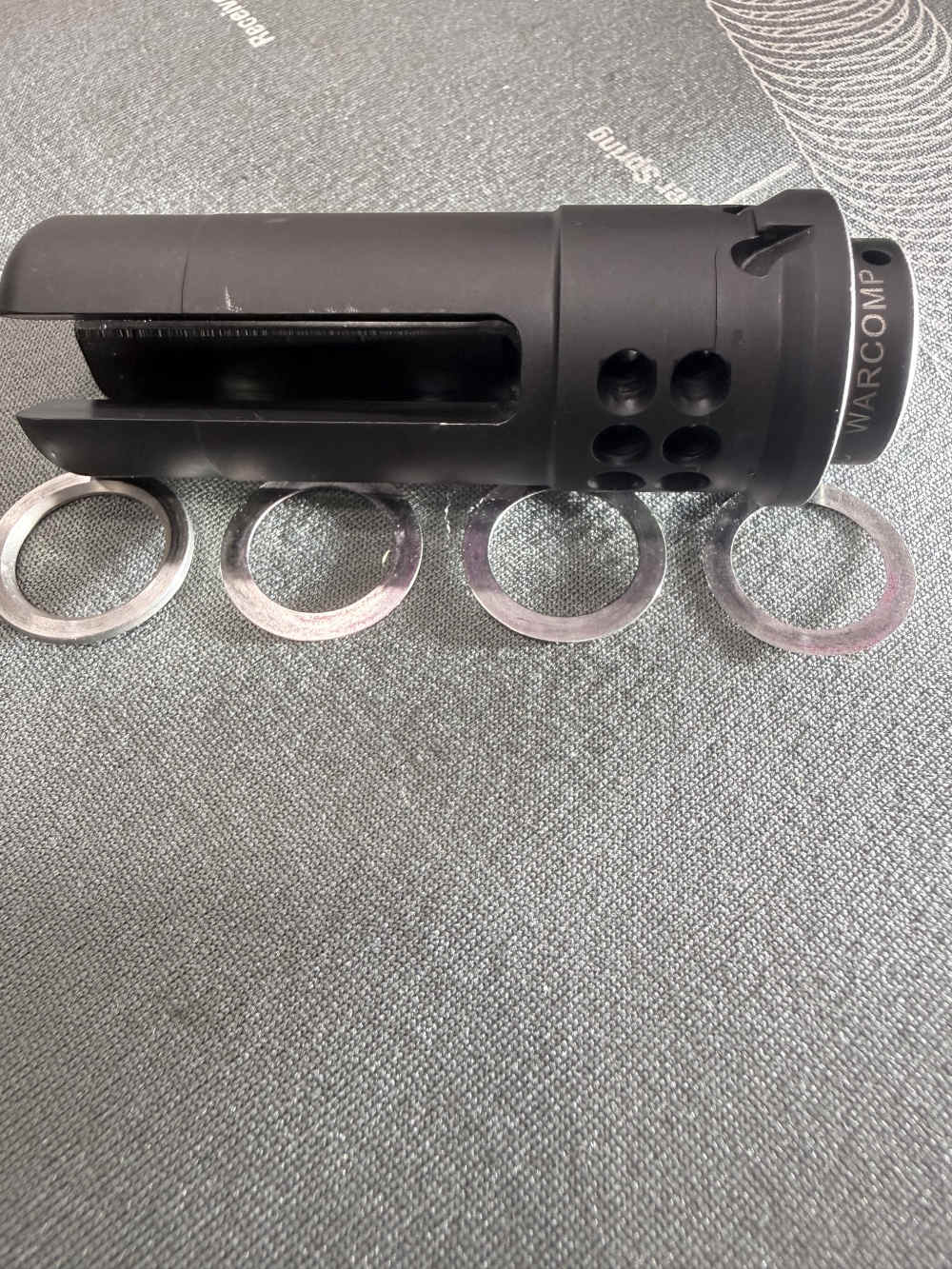 SureFire WARCOMP 556 3-Prong Flash Hider 1/2x28 – Lightly Used w/ Shims-img-5