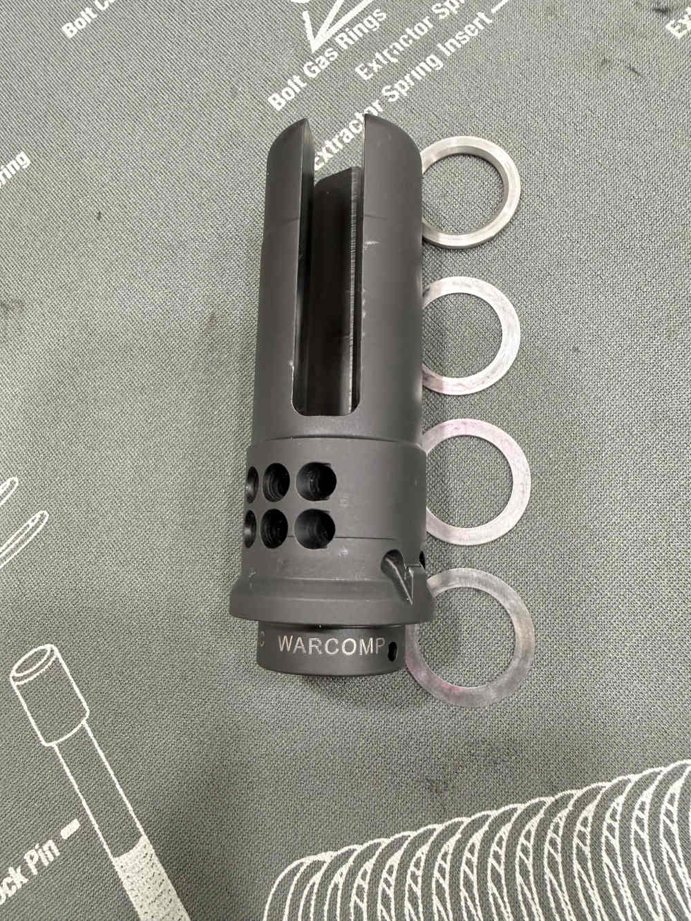 SureFire WARCOMP 556 3-Prong Flash Hider 1/2x28 – Lightly Used w/ Shims-img-0