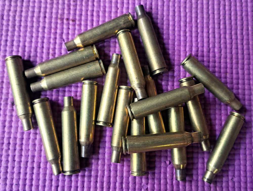 Seventy Five 6.5 x 55mm Swedish Brass Casings -img-1