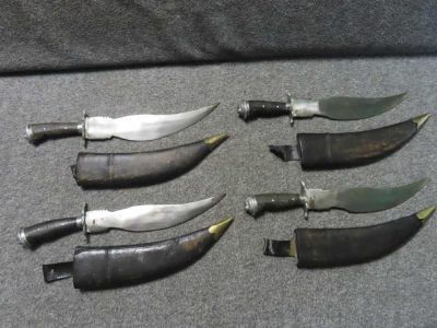4-INDIAN BELT KNIVES W/ 9" CURVED BLADES, HORN GRIPS, LION HEAD POMMEL CAPS