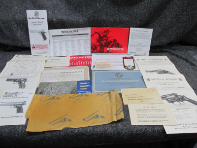 LOT OF SMITH & WESSON AND WINCHESTER MANUALS, PAPER WRAP, MUCH MORE